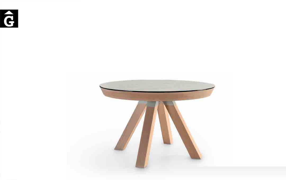 Taula-rodona-Water-extensible-sobre-Dekton-fons-blanc-Pure-Designs-mobles-Gifreu